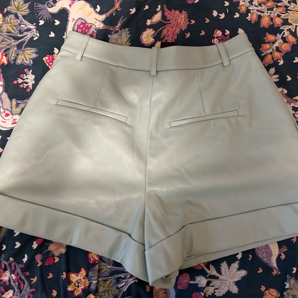 Alice + Olivia Conry Vegan Leather Teal Pleated Cuff Shorts - Picture 4 of 7